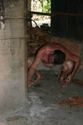 Bruce, stoking the kiln